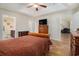 Comfortable main bedroom includes access to the main bath and another doorway, plus a ceiling fan at 95 Timber Run Dr., Georgetown, SC 29440