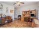 Bright office space with wood-look floors, ceiling fan, desk and wooden storage at 95 Timber Run Dr., Georgetown, SC 29440