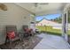 Screened porch includes nice outdoor seating and an open view to the backyard at 95 Timber Run Dr., Georgetown, SC 29440