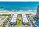 Gorgeous aerial view features multiple buildings, a pool, and pristine beach access at 9660 Shore Dr. # 208, Myrtle Beach, SC 29572
