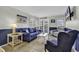 Inviting living room with comfortable seating, tile floors, and access to a balcony at 9660 Shore Dr. # 208, Myrtle Beach, SC 29572