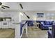 Open living area with kitchen bar, seating, and stylish coastal decor at 9660 Shore Dr. # 208, Myrtle Beach, SC 29572