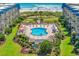 Inviting kidney-shaped pool area nestled between well-maintained condo buildings near the beach at 9660 Shore Dr. # 208, Myrtle Beach, SC 29572