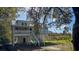 Charming two-story home with a metal roof, porch and stairway at Tbd Park St., Georgetown, SC 29440