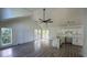 Spacious living room with wood floors, a ceiling fan, and bright, airy windows at Tbd Park St., Georgetown, SC 29440