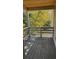 Relaxing porch showcasing wood flooring and an enclosed natural view of the landscape at Tbd Park St., Georgetown, SC 29440