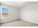 Bedroom features a large window and neutral carpeting at 1029 Woodside Dr., Conway, SC 29526