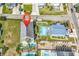 Aerial view of home and swimming pool, and landscaping in the neighborhood at 113-A Vista Dr., Garden City Beach, SC 29576