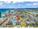 Aerial view of coastal home near beach, showcasing its prime location and proximity to ocean at 113-A Vista Dr., Garden City Beach, SC 29576