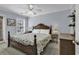 Bedroom with carpet, and a decorative wood frame bed and furnishings at 113-A Vista Dr., Garden City Beach, SC 29576