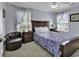 Bedroom with carpet, ceiling fan, and two windows with lots of natural light at 113-A Vista Dr., Garden City Beach, SC 29576