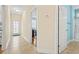 Hallway featuring tile floors, bedroom doorway and bathroom doorway at 128 Lake Pointe Dr., Murrells Inlet, SC 29576