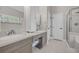 Spacious bathroom with double sinks, white cabinets, and ample counter space at 15 Cherbourg Ct., Pawleys Island, SC 29585