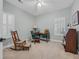 Cozy bedroom with a ceiling fan, neutral walls, carpet and bright natural light at 15 Cherbourg Ct., Pawleys Island, SC 29585