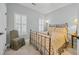 Bedroom with neutral walls, carpet and bright natural light at 15 Cherbourg Ct., Pawleys Island, SC 29585