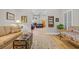 Inviting living room showcasing hardwood floors and seamless flow into other areas at 15 Cherbourg Ct., Pawleys Island, SC 29585