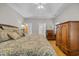 Serene main bedroom with hardwood floors, tray ceiling, and ample closet space at 15 Cherbourg Ct., Pawleys Island, SC 29585