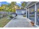 Exterior view of back of home, including garage, yard, and patio at 156 Hummingbird Ct., Myrtle Beach, SC 29579