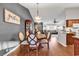 Inviting dining room with hardwood floors and view into the living room at 156 Hummingbird Ct., Myrtle Beach, SC 29579