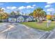 Well maintained brick home with an extended driveway and mature landscaping at 156 Hummingbird Ct., Myrtle Beach, SC 29579