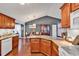 Spacious kitchen and dining area with granite countertops and hardwood floors at 156 Hummingbird Ct., Myrtle Beach, SC 29579