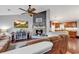 Cozy living space with a brick fireplace, hardwood floors, and open layout at 156 Hummingbird Ct., Myrtle Beach, SC 29579