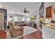 Comfortable living room with vaulted ceilings, fireplace, and hardwood floors at 156 Hummingbird Ct., Myrtle Beach, SC 29579