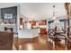 Open living area connecting kitchen and dining, with hardwood floors and ample light at 156 Hummingbird Ct., Myrtle Beach, SC 29579