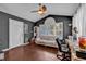 Cozy office featuring a white couch, large window, hardwood floors and desk area at 156 Hummingbird Ct., Myrtle Beach, SC 29579