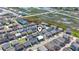 Aerial view of neighborhood with beach houses and a pool, close to the marsh at 161 Easy St., Garden City Beach, SC 29576