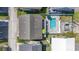 Aerial view of home with pool, deck, and landscaped backyard, perfect for entertaining at 161 Easy St., Garden City Beach, SC 29576