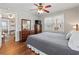 Serene bedroom with dark wood furniture, hardwood floors, and a calming atmosphere at 161 Easy St., Garden City Beach, SC 29576