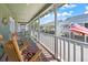 Relaxing porch with rocking chairs, perfect for enjoying the neighborhood view at 161 Easy St., Garden City Beach, SC 29576