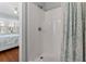 Bathroom shower stall with a view into the bedroom at 161 Easy St., Garden City Beach, SC 29576