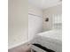 Bedroom featuring soft carpeted floors, white walls and furniture, and closet at 1620 San Andres Ave., Little River, SC 29566