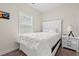 Bedroom featuring soft carpeted floors, white walls and furniture and a comfy queen sized bed at 1620 San Andres Ave., Little River, SC 29566