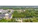 Aerial view of a residential community, showcasing a neighborhood surrounded by lush greenery at 1620 San Andres Ave., Little River, SC 29566