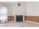 Detailed fireplace with tile surround, classic mantel, and neutral walls for a cozy and inviting space at 176 Whispering Oaks Dr., Longs, SC 29568
