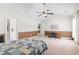 Vaulted ceiling bedroom with neutral walls, a ceiling fan, and a carpeted floor at 176 Whispering Oaks Dr., Longs, SC 29568
