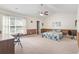 Vaulted ceiling bedroom with neutral walls, a ceiling fan, and a carpeted floor at 176 Whispering Oaks Dr., Longs, SC 29568