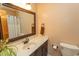 A full bath featuring an updated sink, toilet, and shower with a dark-stained vanity at 18 Pine Valley Ln., Surfside Beach, SC 29575