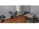 A workout room with gray walls and hardwood floors at 18 Pine Valley Ln., Surfside Beach, SC 29575
