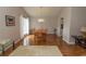 Spacious dining room with hardwood floors and elegant lighting at 18 Pine Valley Ln., Surfside Beach, SC 29575