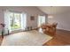 Bright dining room with vaulted ceiling and large windows overlooking the yard at 18 Pine Valley Ln., Surfside Beach, SC 29575