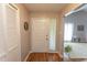 Inviting foyer with hardwood floors and ample natural light at 18 Pine Valley Ln., Surfside Beach, SC 29575