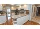Updated kitchen featuring granite countertops, white cabinets, and stainless steel appliances at 18 Pine Valley Ln., Surfside Beach, SC 29575