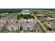Aerial view of condo buildings with parking and well-manicured green space in a convenient location at 186 Ella Kinley Circle # 101, Myrtle Beach, SC 29588