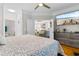 Bedroom boasts ceiling fan, walk-in closet, TV, and ensuite bathroom access for optimal convenience at 186 Ella Kinley Circle # 101, Myrtle Beach, SC 29588