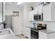 Bright kitchen with granite countertops, stainless steel appliances, and subway tile backsplash at 186 Ella Kinley Circle # 101, Myrtle Beach, SC 29588