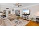 Open living space with access to screened in porch and beautiful hardwood floors at 186 Ella Kinley Circle # 101, Myrtle Beach, SC 29588